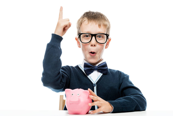 Successful small businessman with a piggy bank with the ingeniou - Foto, Imagen