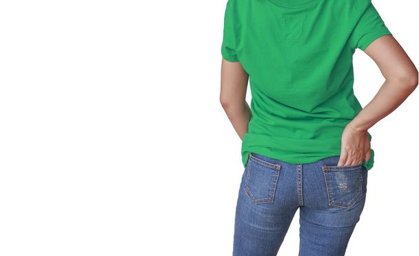 Szép test nő zöld póló és kék farmer  - Fotó, kép