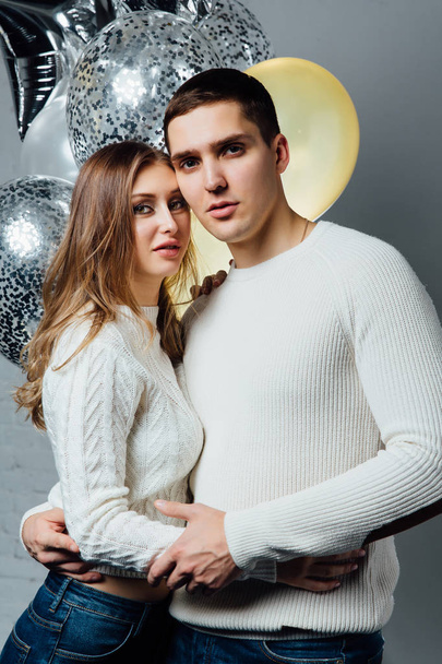 beautiful young attractive couple celebrating a birthday or a Valentines day holiday. - Photo, Image