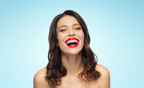 beautiful laughing young woman with red lipstick - Foto, afbeelding