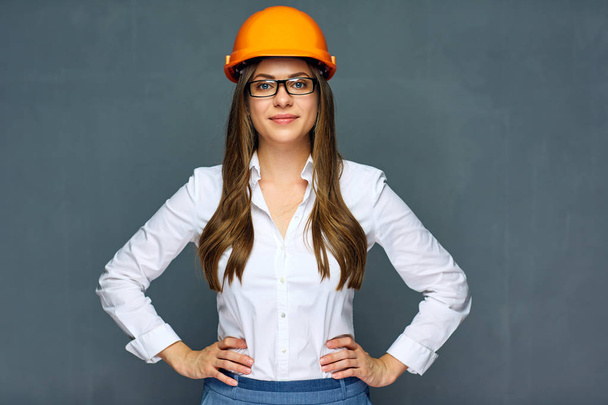 businesswoman engineer builder in white shirt and orange helmet  - Fotografie, Obrázek