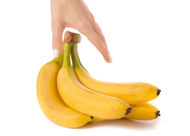 A bunch of bananas in a hand - Foto, Imagen