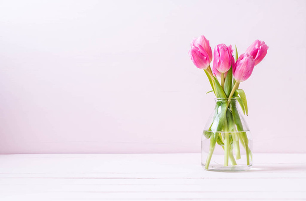 pink tulip flower on wood background - Фото, изображение