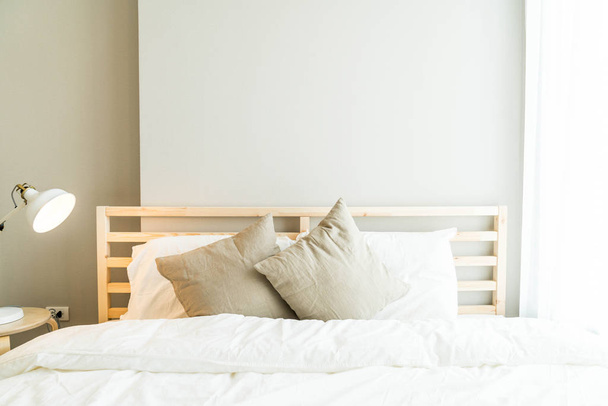 Comfortable Pillow on bed decoration in bedroom  - Φωτογραφία, εικόνα