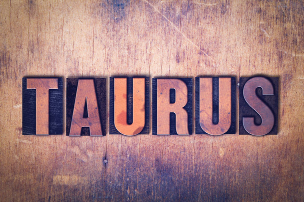 Tema Taurus Letterpress Word on Wood Background
 - Foto, Imagen