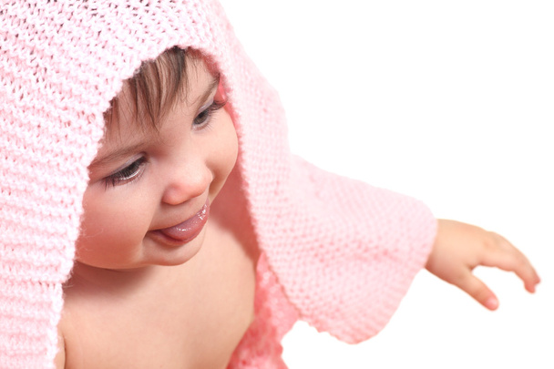 Baby under a pink blanket - Фото, зображення