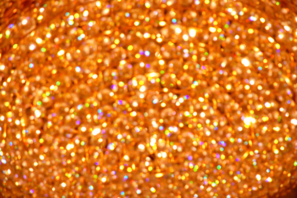 Yellow and orange bokeh background . Yellow bokeh from natural . Christmas light background. Holiday glowing backdrop. Defocused Background With Blinking Stars. Blurred Bokeh. Blurred abstract backgro - Photo, Image