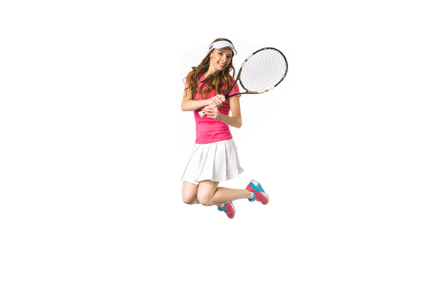 hermosa chica atractiva jugando tenis y saltar aislado en blanco
 - Foto, Imagen
