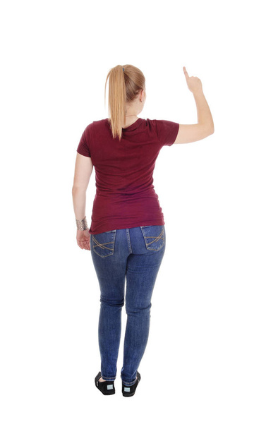 Woman standing from back with finger up - Fotografie, Obrázek