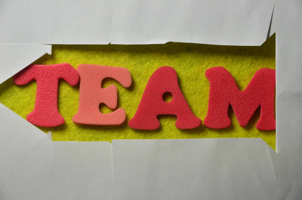 word team on an   abstract colred background - Photo, Image