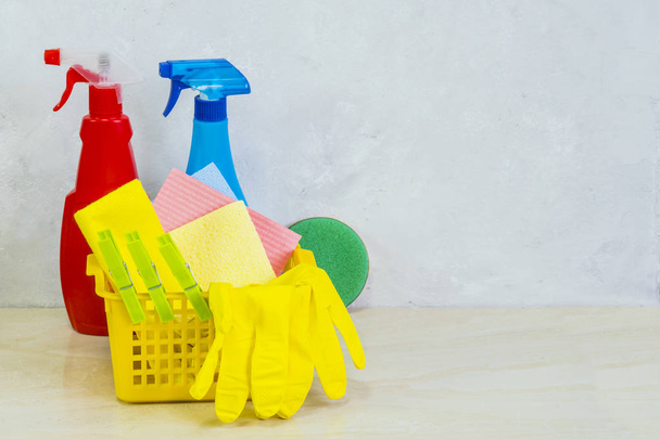 A cleaning kit with tools and products at home.  - Zdjęcie, obraz