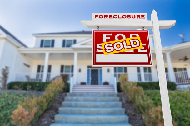 Left Facing Foreclosure Sold For Sale Real Estate Sign in Front of House. - Photo, Image