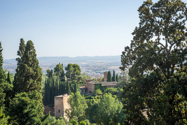 View of the bell tower of the Alhambra  from the Generalife gard - 写真・画像