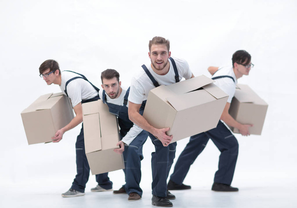 Responsible movers  in a hurry to do their job. - Фото, зображення