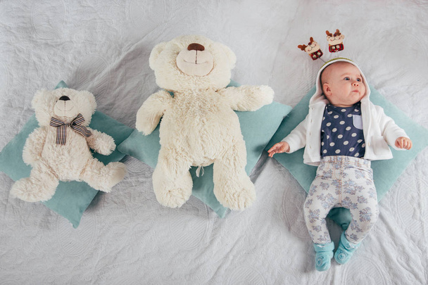 Adorable two month old beautiful  baby girl. Teddy bears - Fotoğraf, Görsel