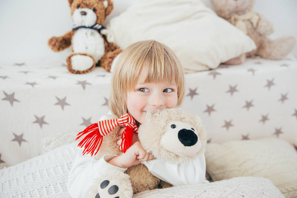 Happy little smiling child  celebrates Christmas. New Year's holidays. - Valokuva, kuva