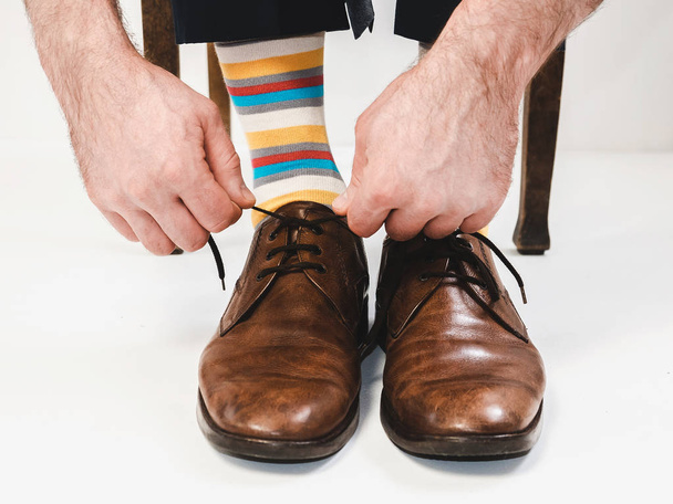 Men's feet in stylish shoes and bright socks - Fotoğraf, Görsel