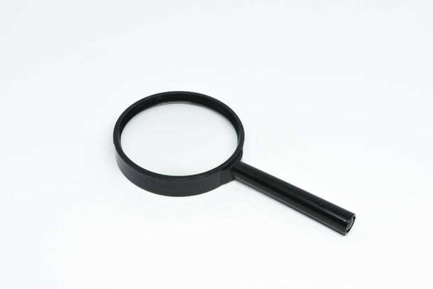 Magnifying glass on the white background - Photo, Image