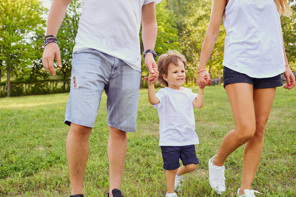 Happy family in the park. - Photo, image