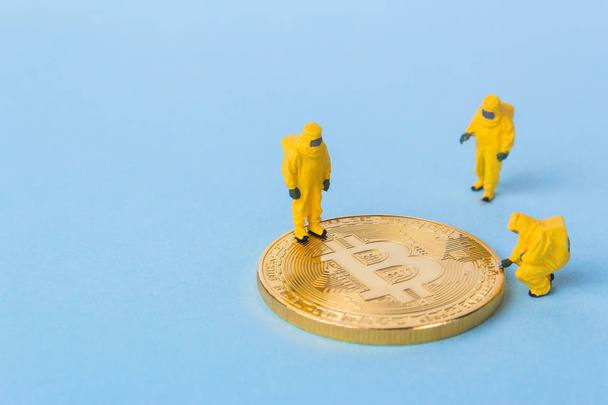 Coin bitcoin is explored by a team of scientists. Empty space for text - Fotografie, Obrázek