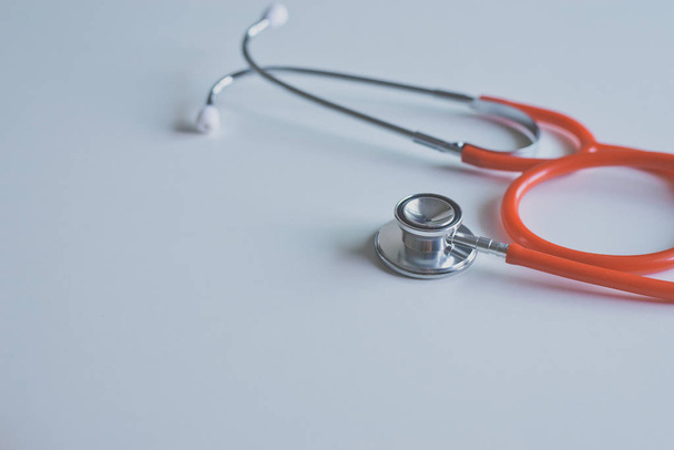 Stethoscope red on table,Healthcare and medical concept,Selective focus - Foto, Imagem