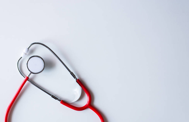Stethoscope red on table,Healthcare and medical concept,Selective focus - Photo, image