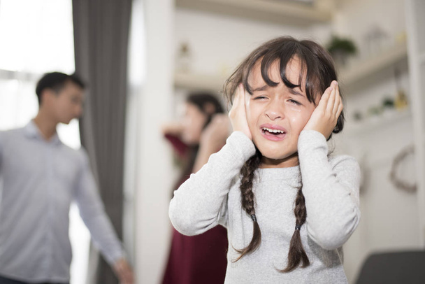 Little girl was crying because dad and mom quarrel, Sad and dramatic scene, Family issued, Children's Rights abused in Early Childhood Education and Social and parrents care problem concept - Photo, Image