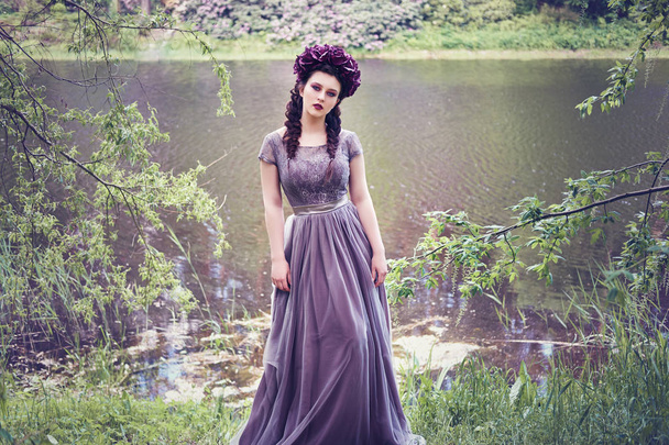 girl in dress in rhododendron garden - Valokuva, kuva