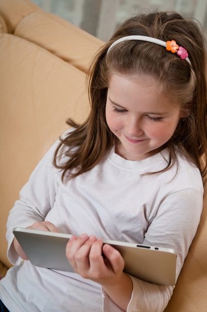 Child playing with tablet - Фото, зображення