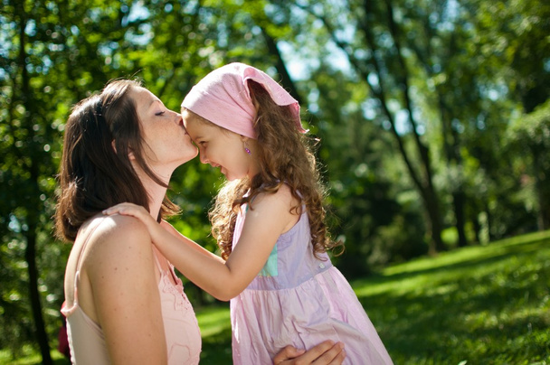 Love - mother kissing her child - Fotografie, Obrázek