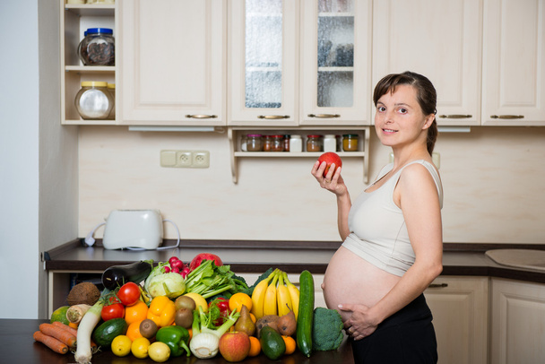 Pregnant woman - healthy food - Photo, image
