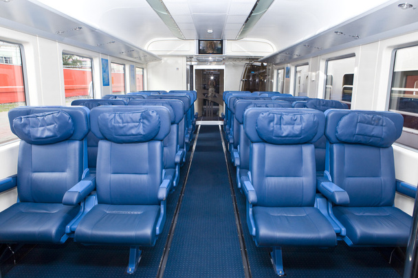 Numbers of empty seats in car of train - Zdjęcie, obraz