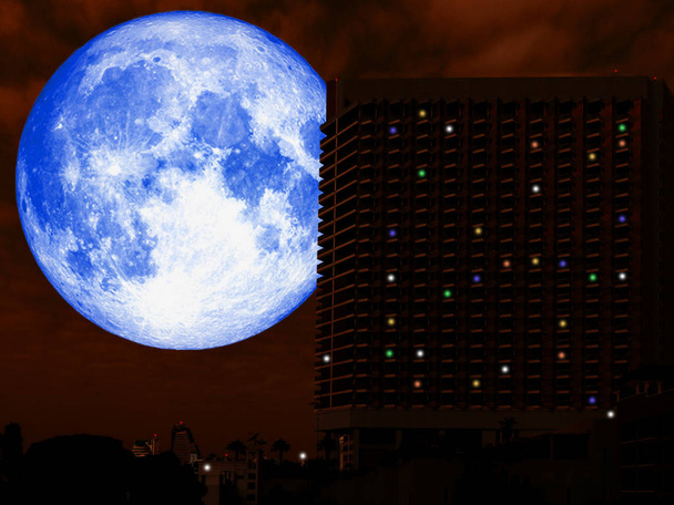 super full blue moon back of hihg building in night - Photo, Image