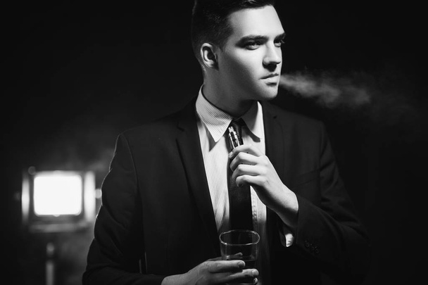 successful man enjoying life smoking drink - Foto, Imagem