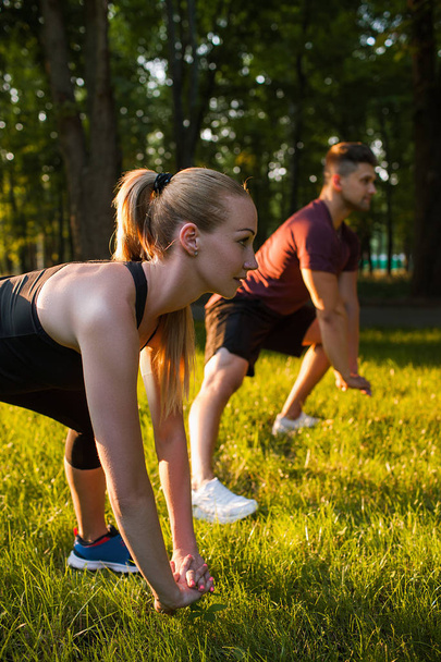 paired workout outdoor fitness sport exercises - Φωτογραφία, εικόνα