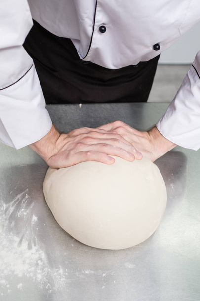 bread baking preparing dough skillful hands - Foto, Imagem