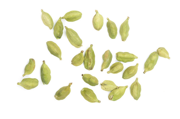 Green cardamom seeds isolated on white background. Top view. lay flat - Фото, изображение