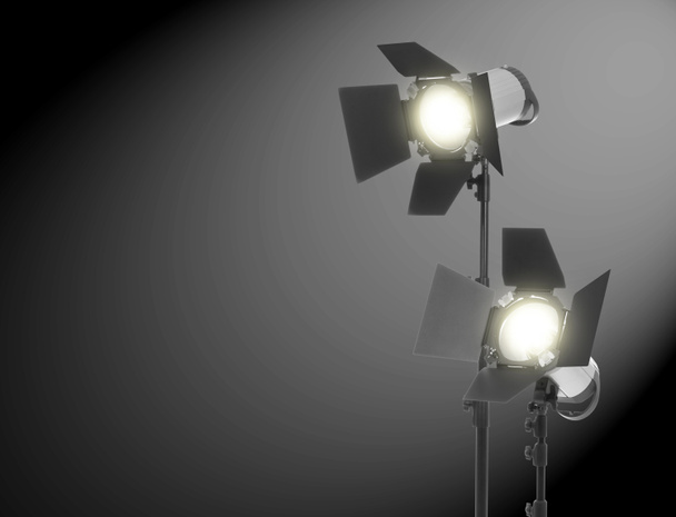 Studio lampen op zwarte achtergrond - Foto, afbeelding
