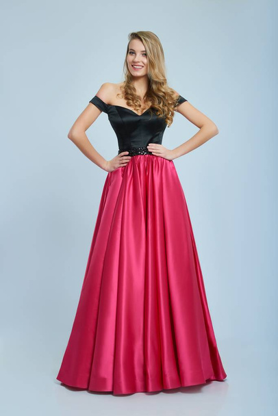 Amazing long evening dress with black and pink colors - Foto, immagini