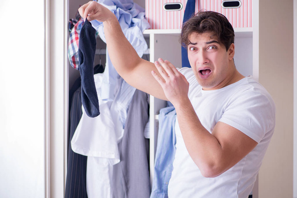 Man helpless with dirty clothing after separating from wife - Foto, immagini