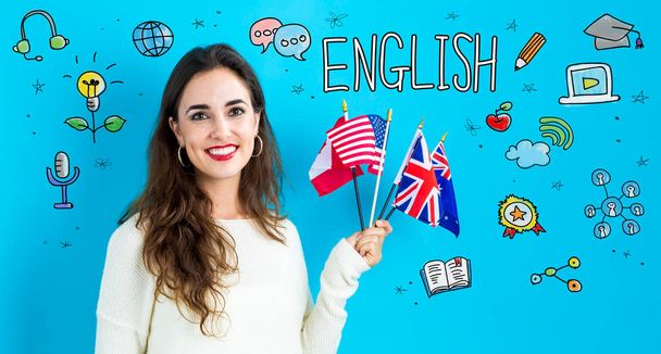English theme with young woman holding flags - Foto, Bild