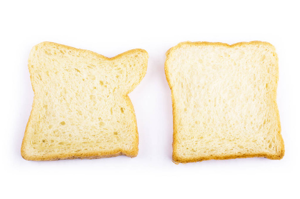 Кусочки хлеба для тоста на белом фоне
 - Фото, изображение