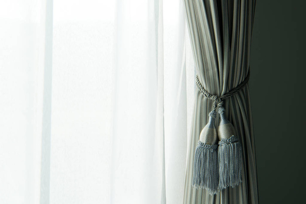 closed up beautiful curtain in daylight home concept. - Photo, Image
