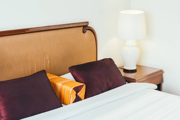 Comfortable pillow on bed decoration interior of hotel room - 写真・画像