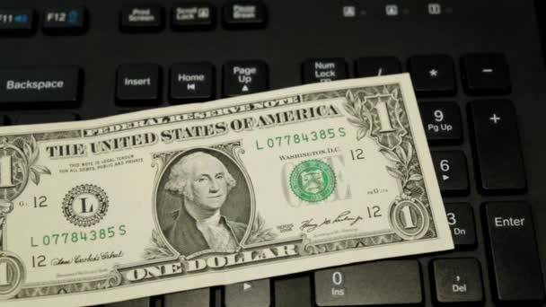 American Dollars from 1 to 100 on the keyboard. - Video