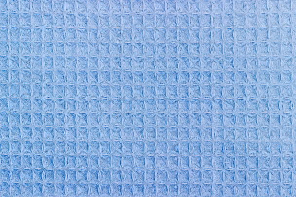 Background of the blue waffle towel closeup - Photo, Image