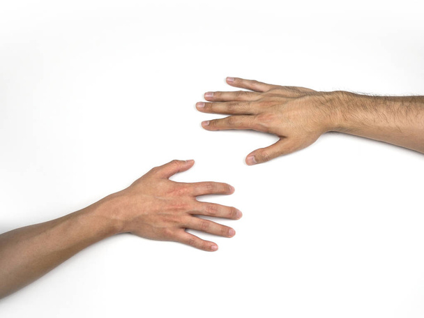 Руки, що досягають один одного на підлозі
 - Фото, зображення