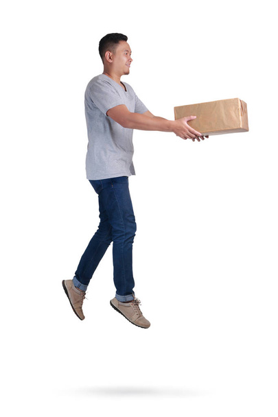 Levitation Courier, Young Man Deliver Package on Air  - Photo, Image