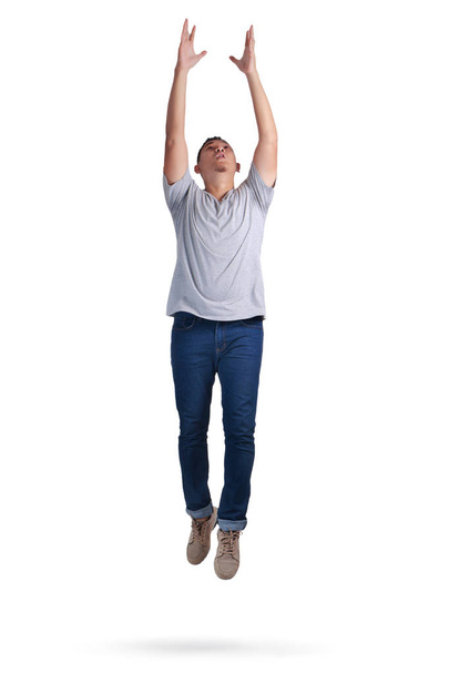 Levitation. Young Man Walking Jumping on Air - Zdjęcie, obraz