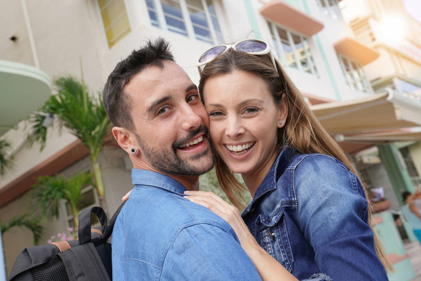 Cheerful young loving couple visiting South beach Miami - Photo, Image